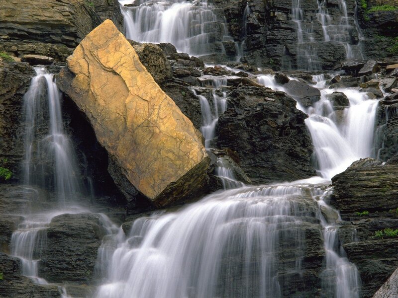 Waterfall with golden rock
