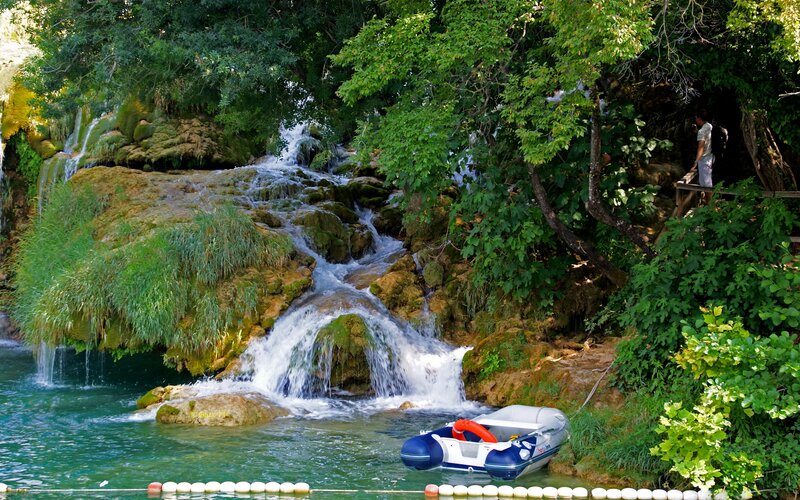 Waterfall with inflatable boat
