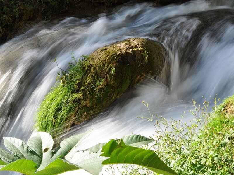 Waterfall with mossy rock