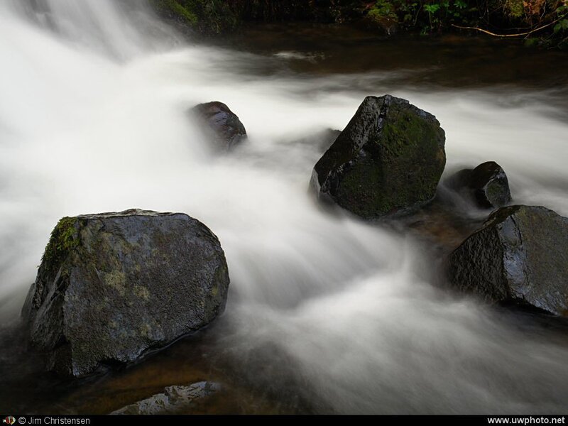 Waterfall with mossy rocks