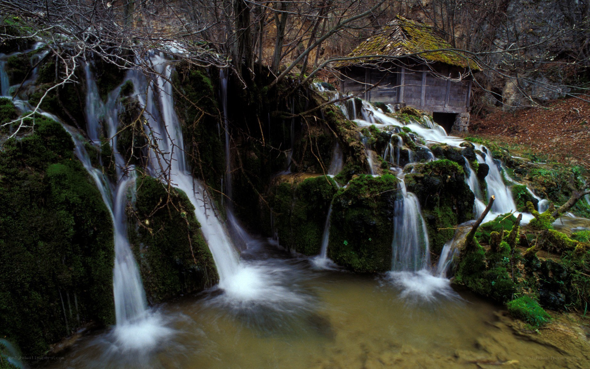 Waterfall with mossy rocks