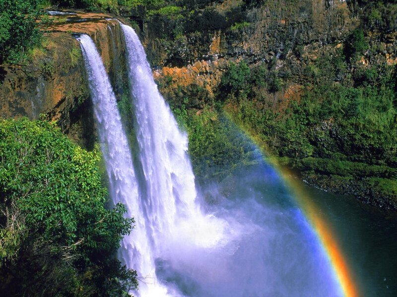 Waterfall with rainbow arc