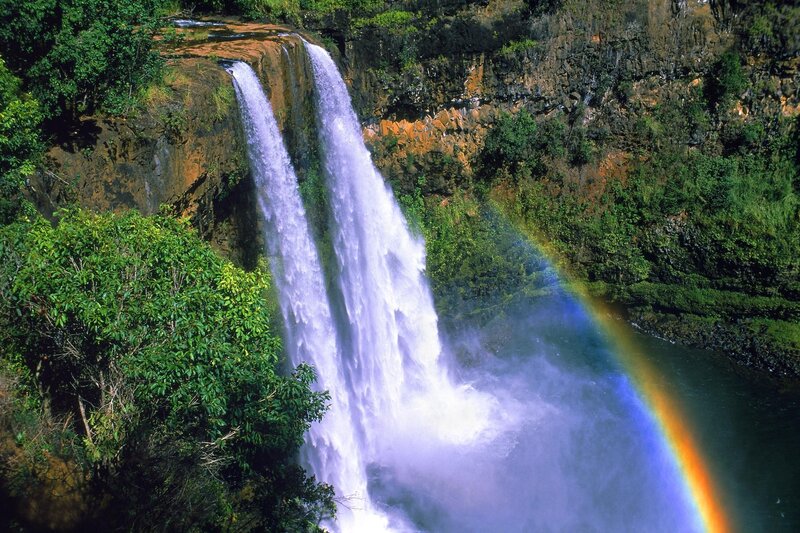 Waterfall with rainbow arc