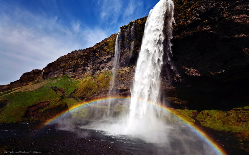 Waterfall with rainbow arc