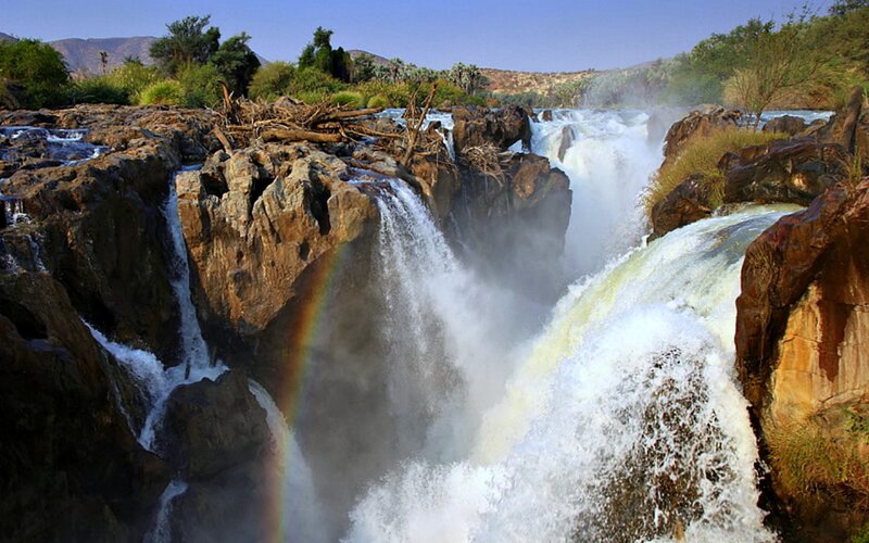 Waterfall with Rainbow — Brown, Dramatic