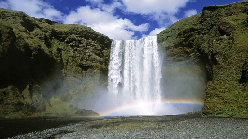 Waterfall with rainbow in Iceland
