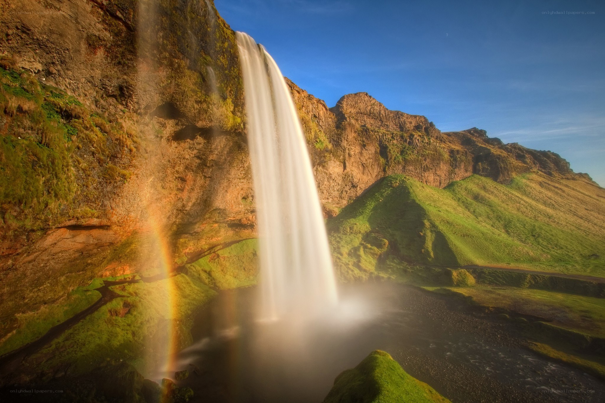 Waterfall with rainbow in Iceland