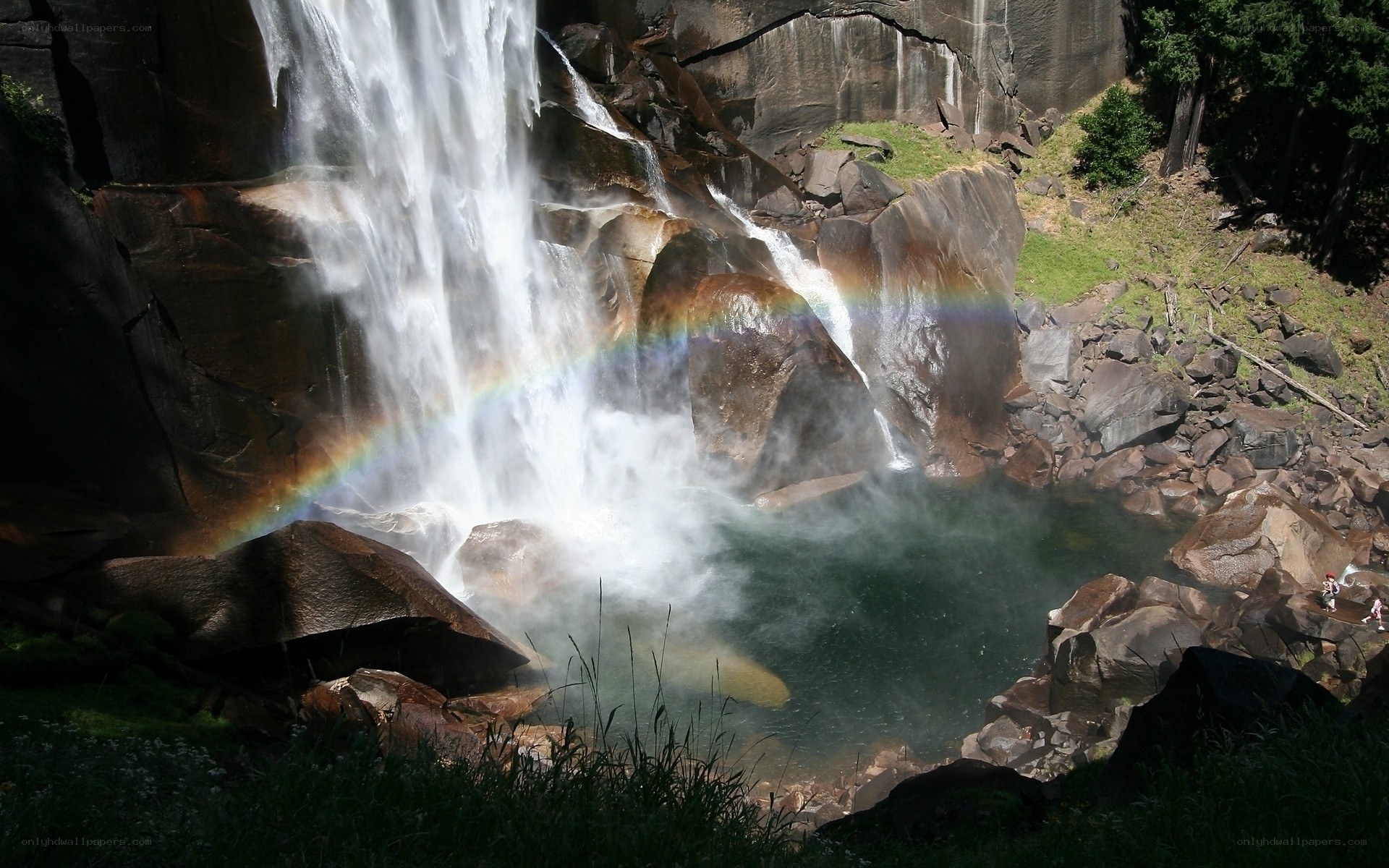 Waterfall with rainbow in Yosemite