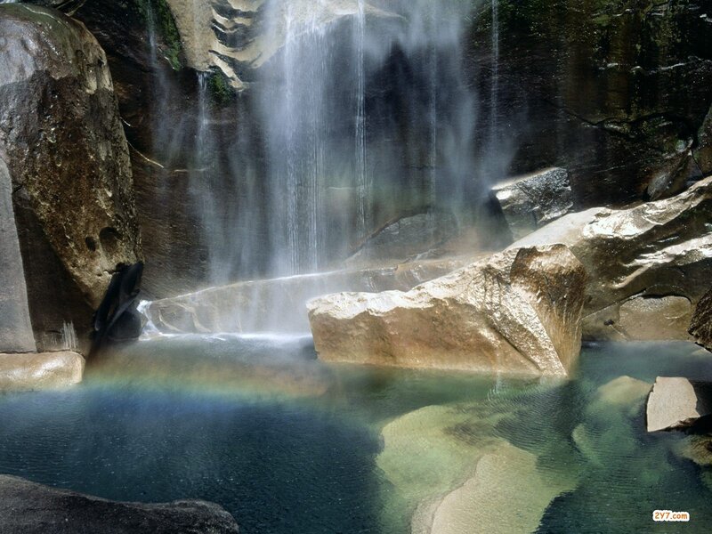Waterfall with rainbow pool