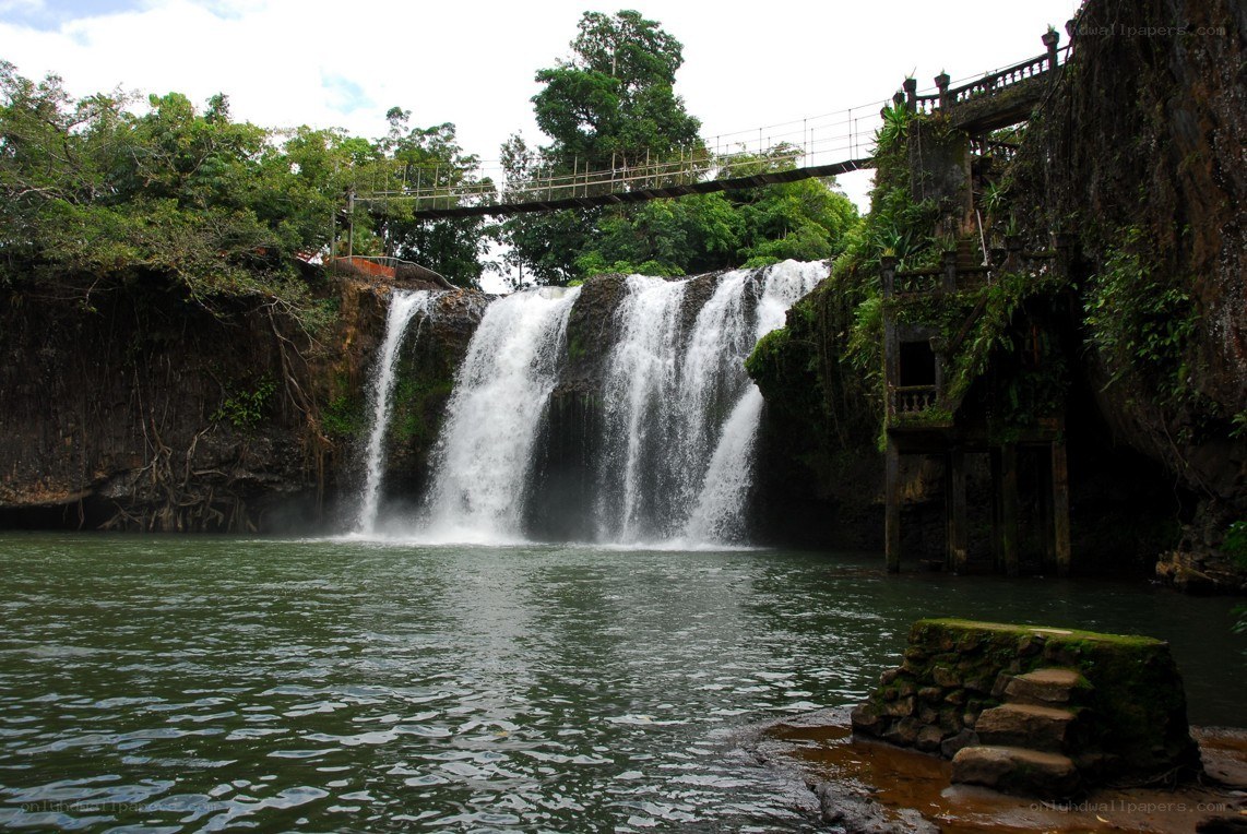 Waterfall with suspension bridge