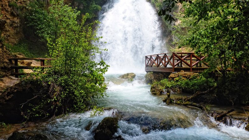 Waterfall with Wooden Bridge — Green, Serene