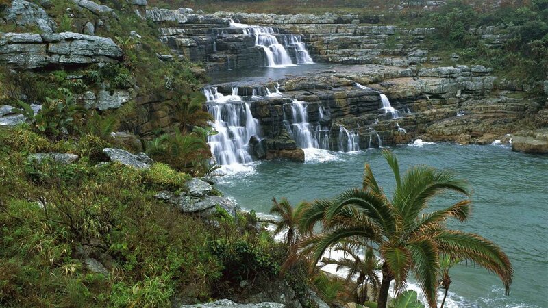 Waterfalls cascading into the sea