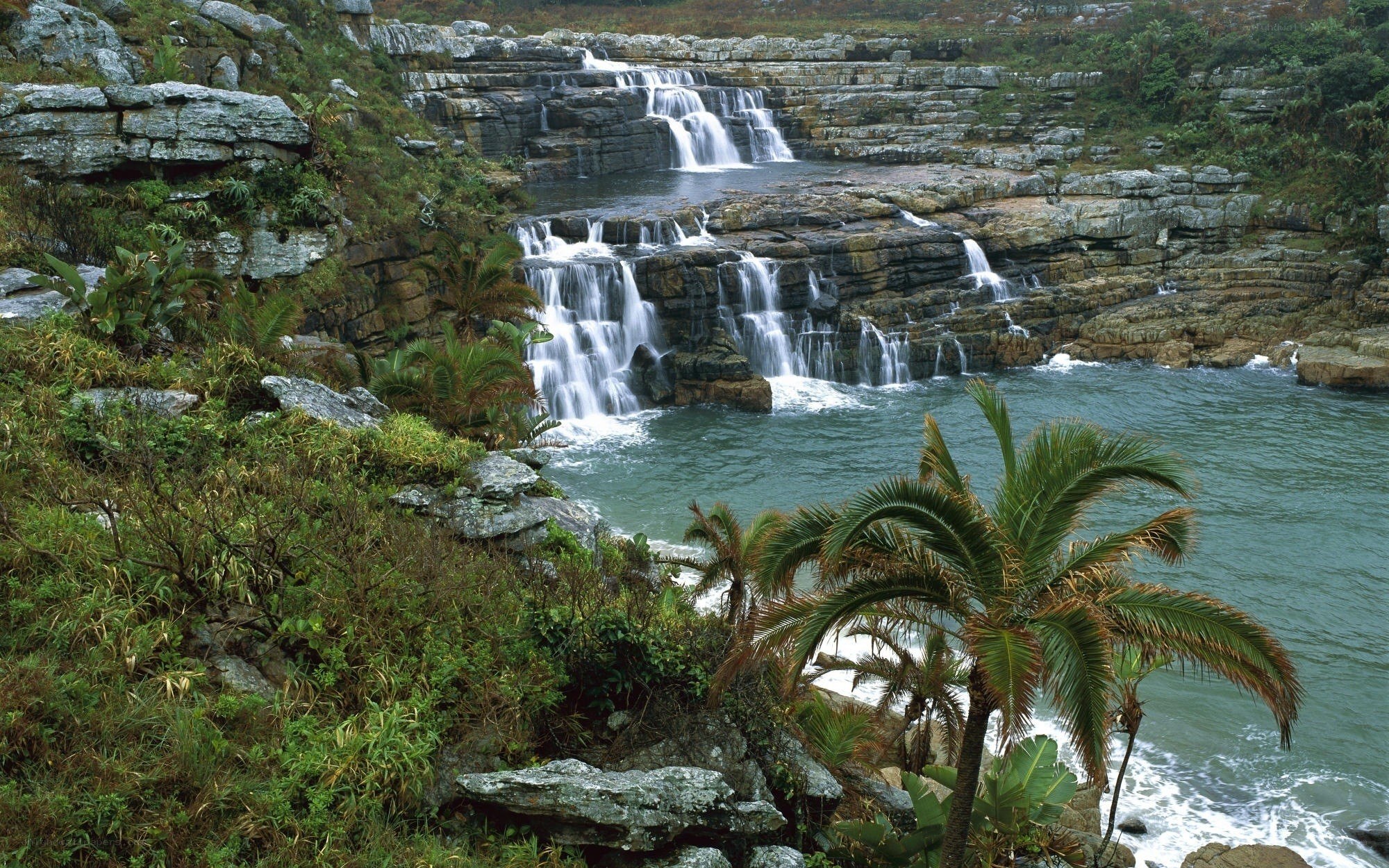 Waterfalls cascading into the sea