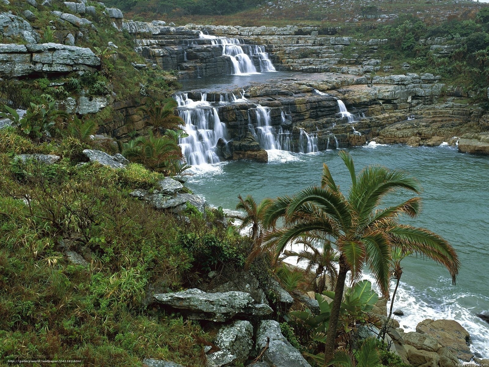Waterfalls cascading into the sea