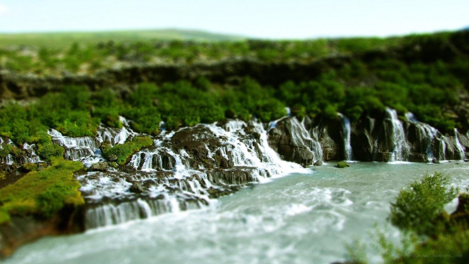 Waterfalls in a green landscape