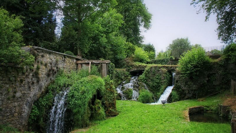 Waterfalls in a lush green park
