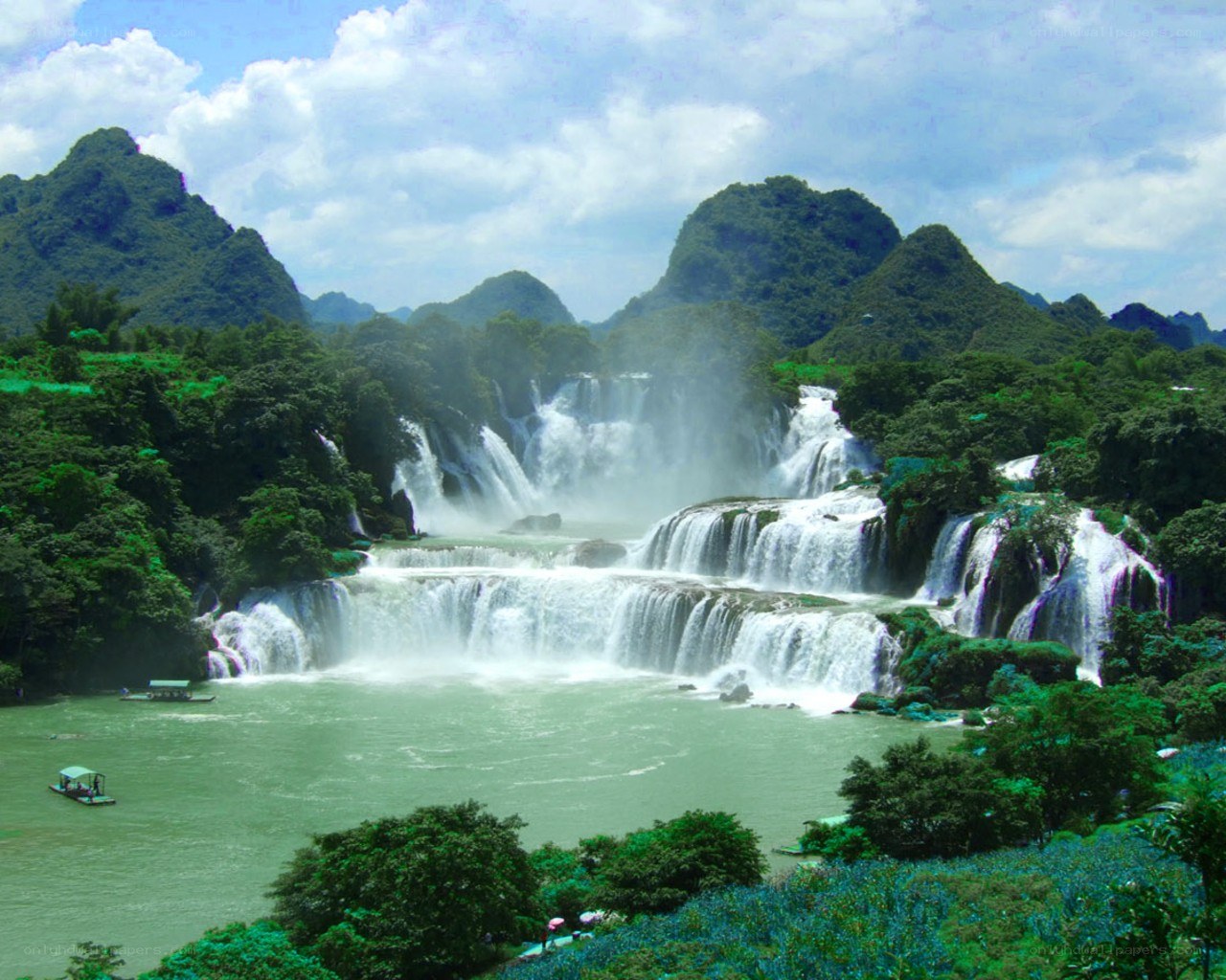 Waterfalls in a lush landscape