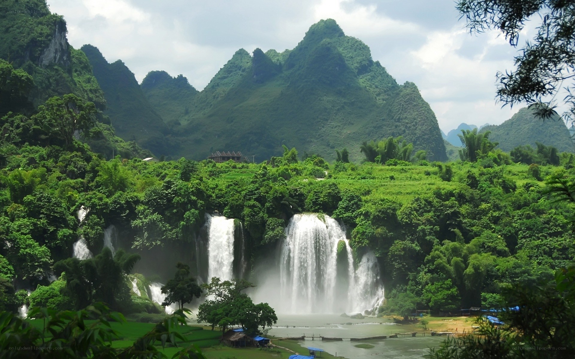 Waterfalls in a lush mountain valley