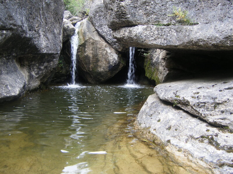 Waterfalls in a rocky canyon