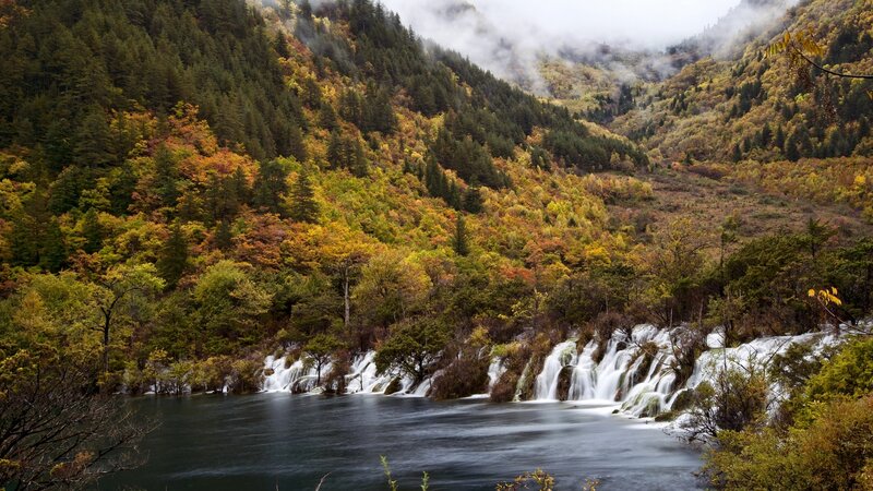 Waterfalls in autumn forest