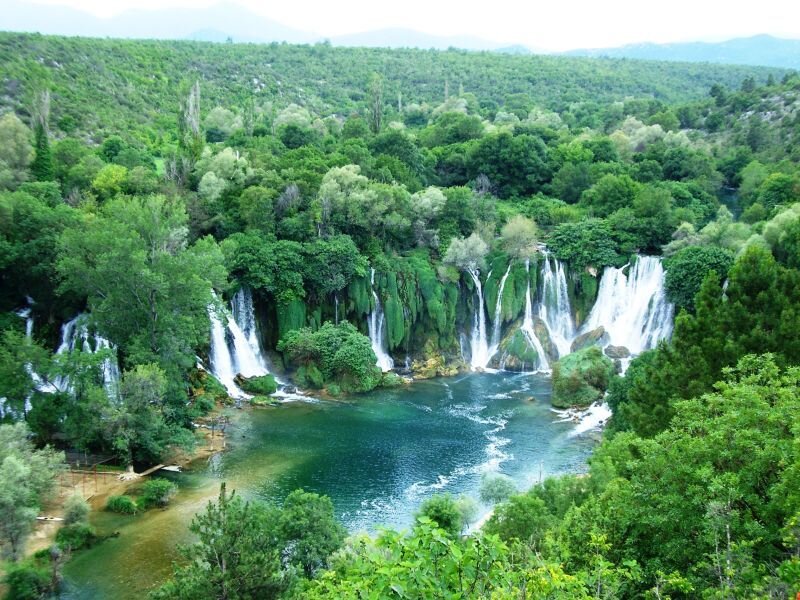 Waterfalls in Forest — Green, Serene, Afternoon, Photograph, Trees, River, Mountains