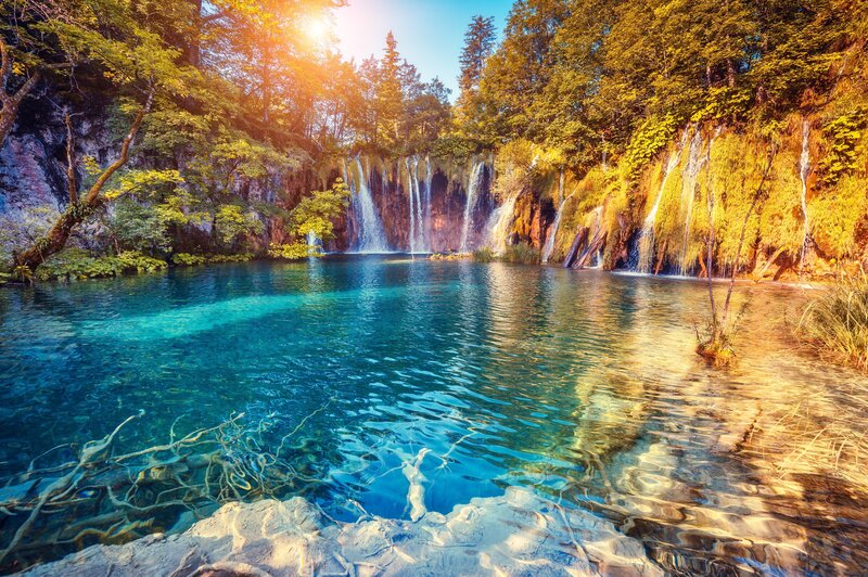 Waterfalls in Forest Lake — Blue, Serene
