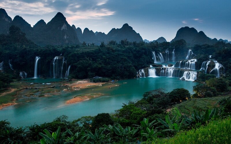 Waterfalls in Karst Landscape — Green, Serene