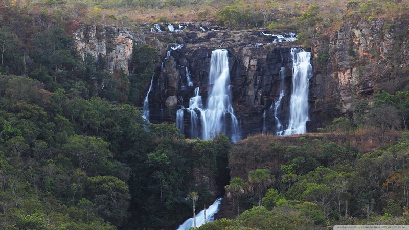 Waterfalls on Cliff Face — Green, Serene