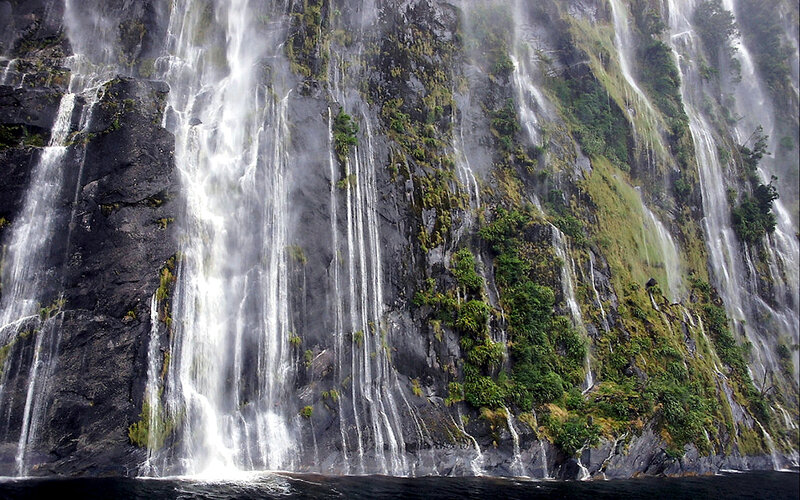 Waterfalls on Cliff Face — Green