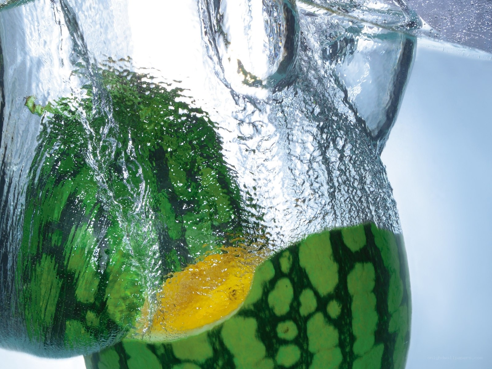 Watermelon and lemon in water
