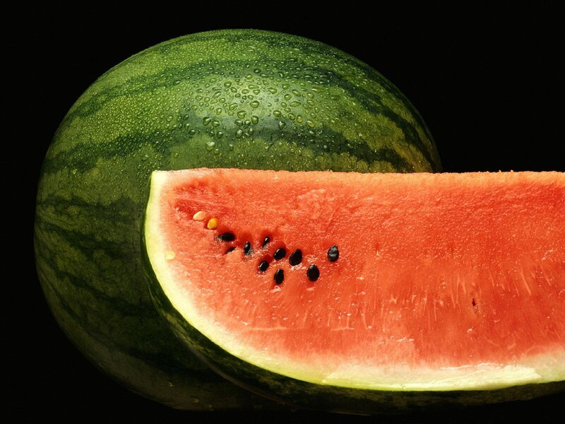 Watermelon slice and whole fruit
