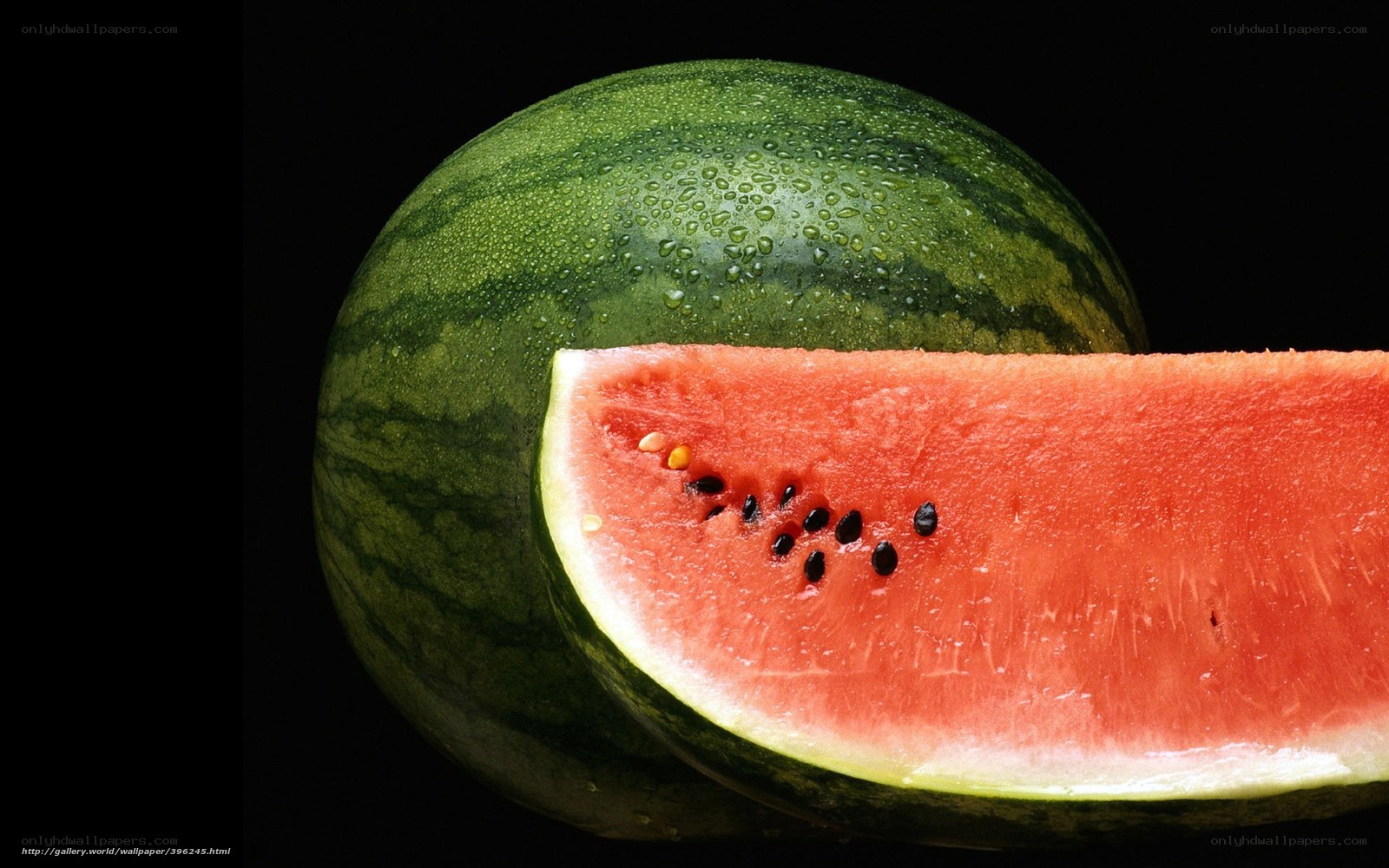 Watermelon slice on black background