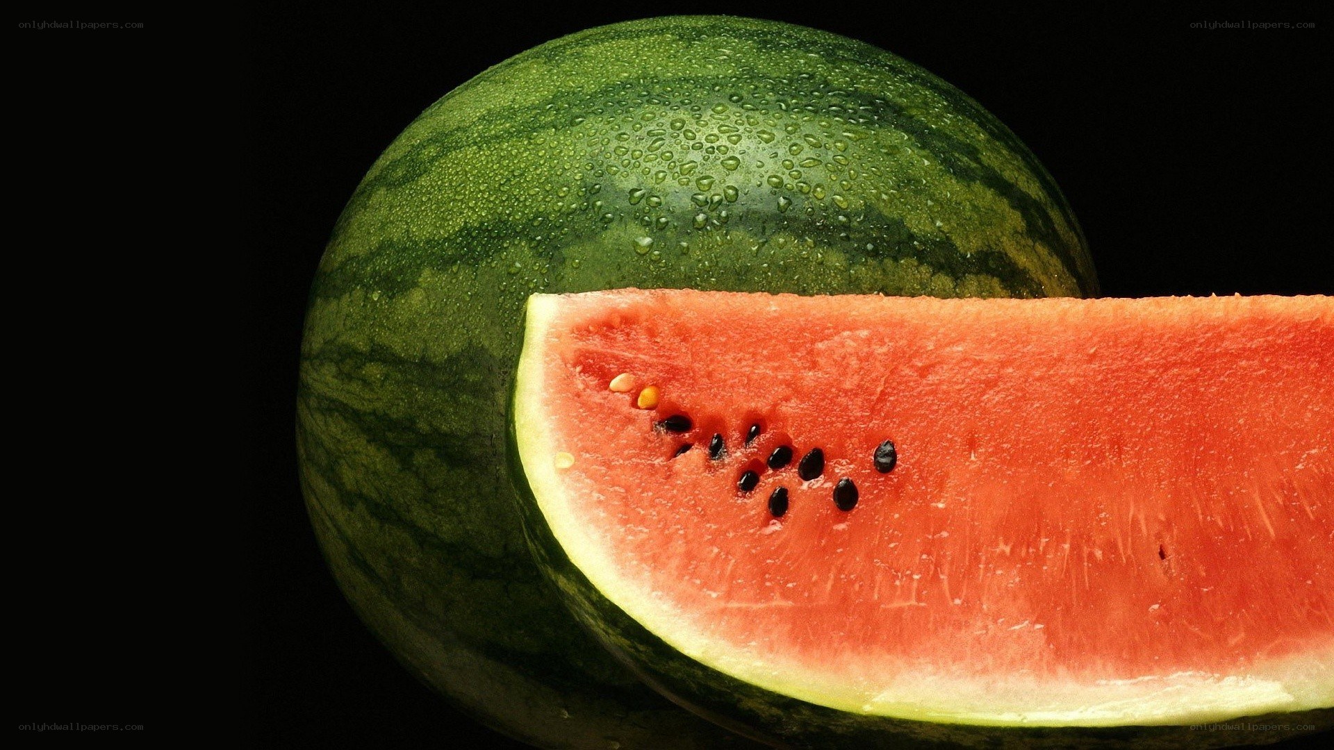 Watermelon slice on black background