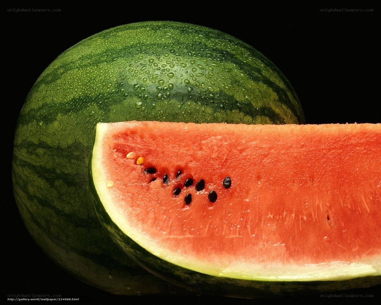 Watermelon slice on black background
