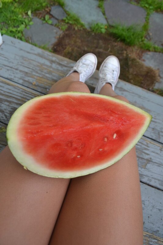 Watermelon slice on lap