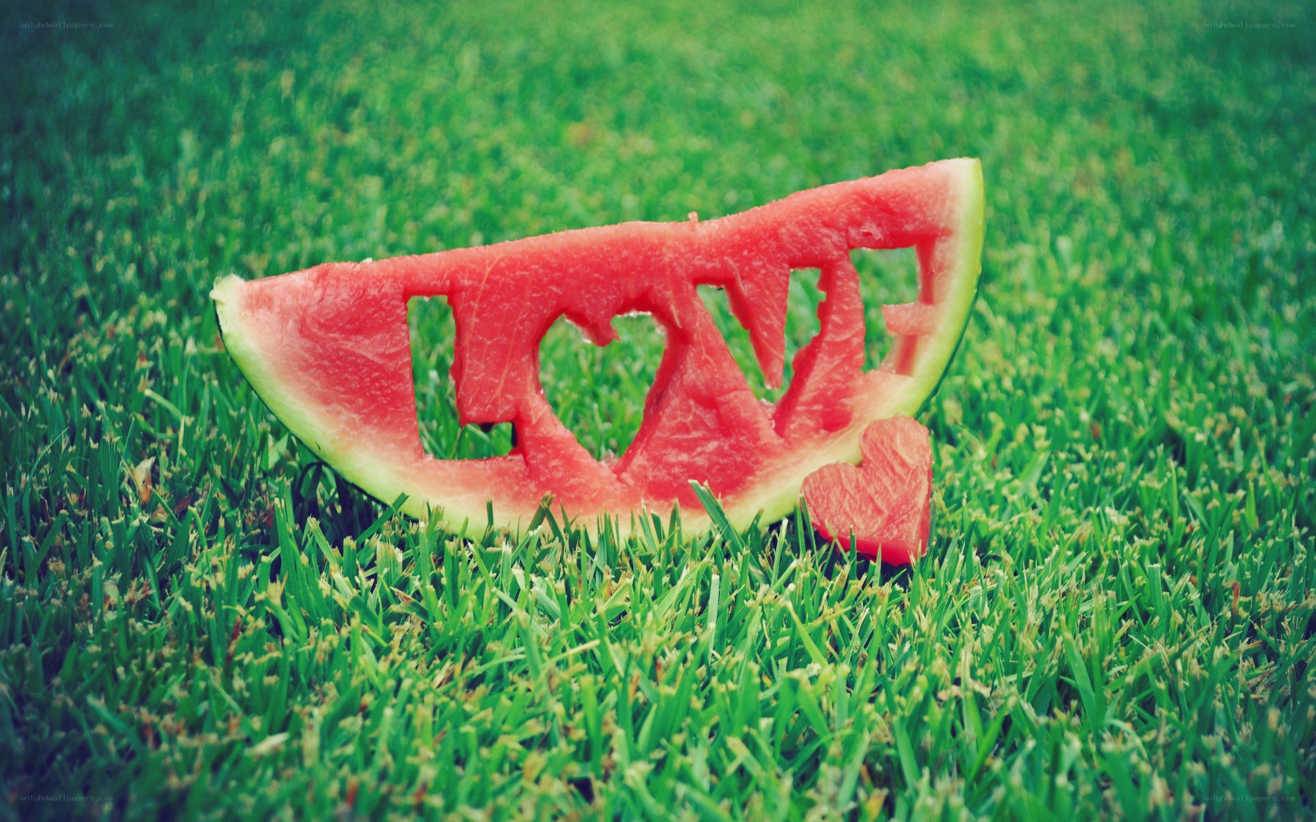 Watermelon slice with love carving