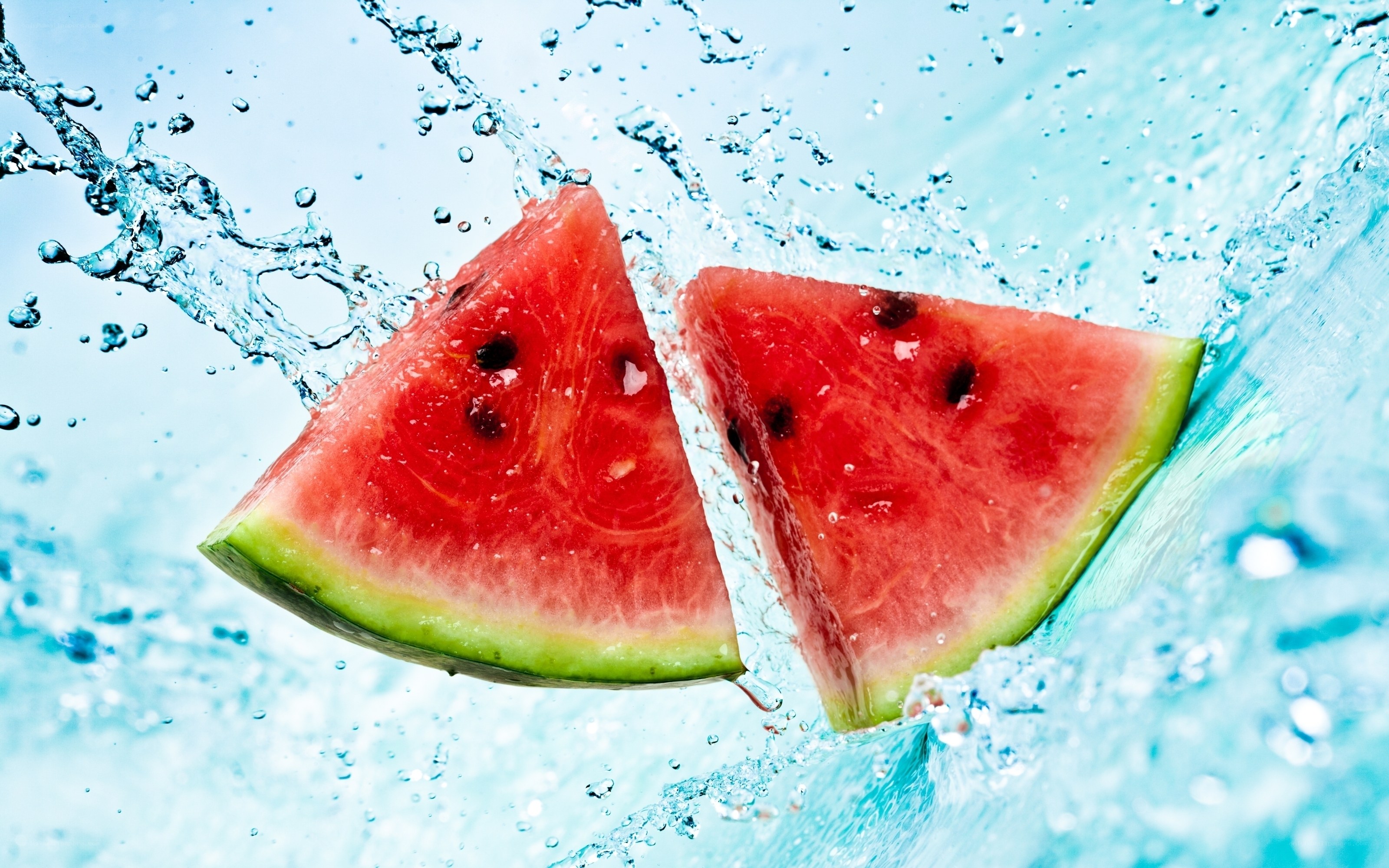 Watermelon slices in water splash