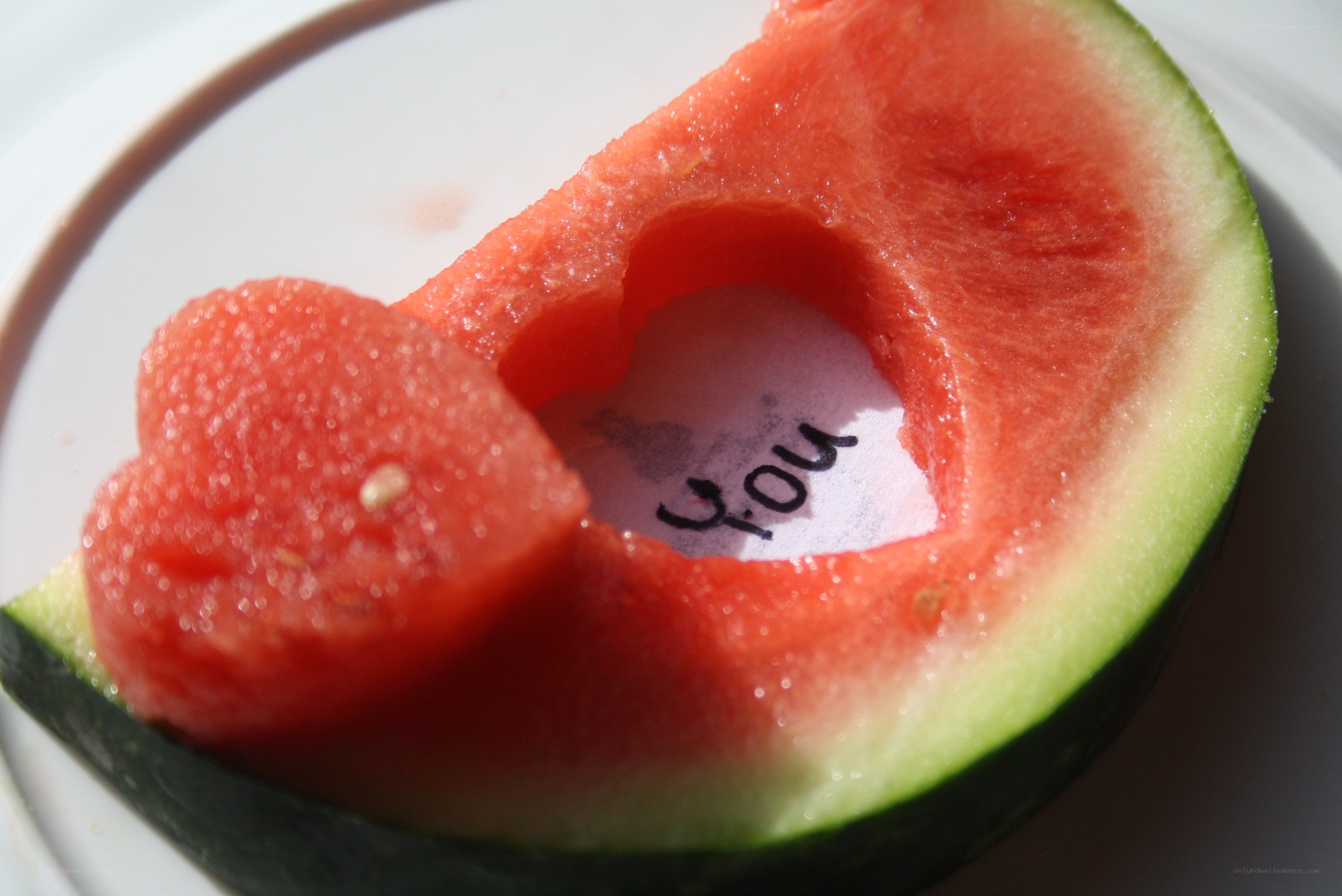 Watermelon with heart-shaped cutout