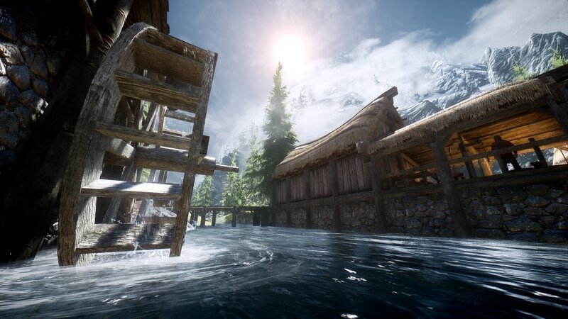 Watermill by a river