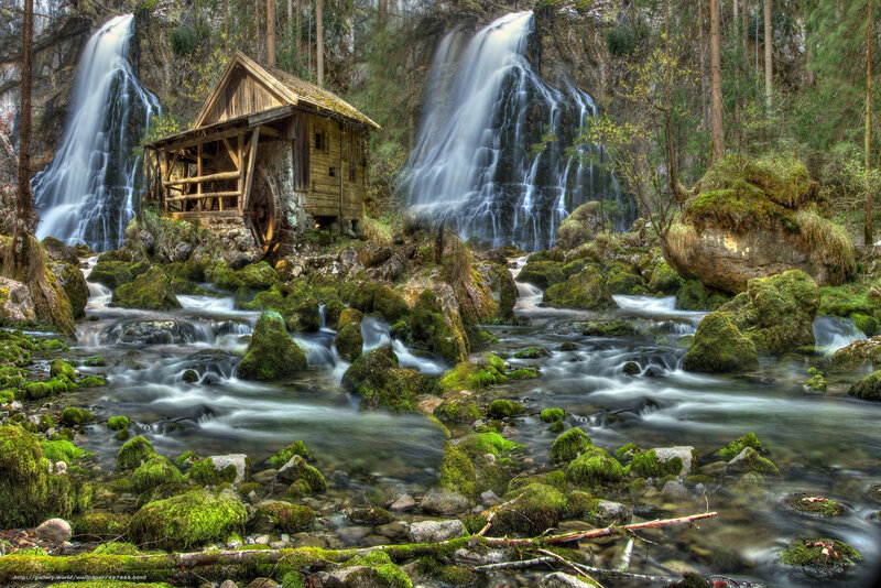 Watermill by a waterfall