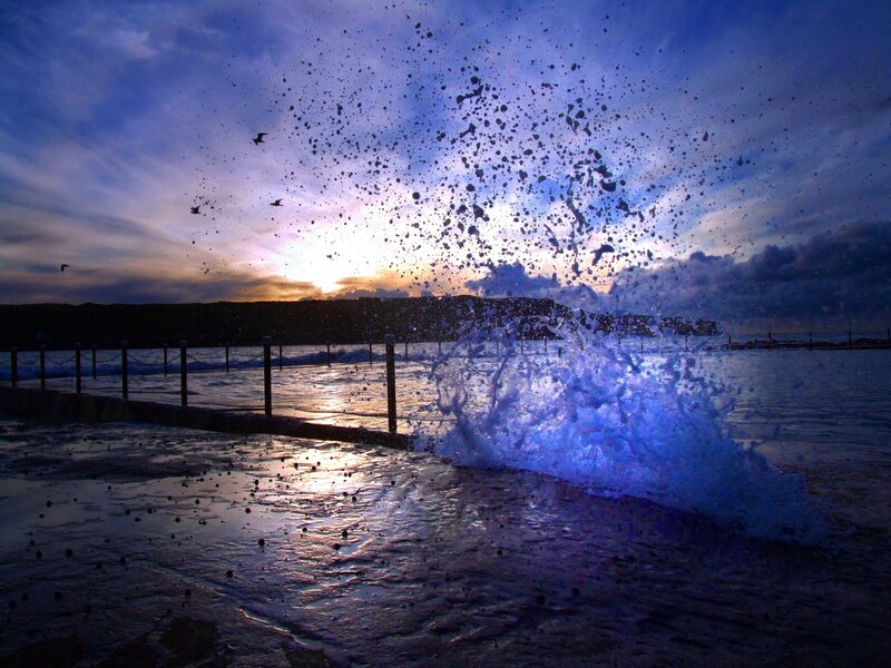 Wave Crashing at Sunset — Blue