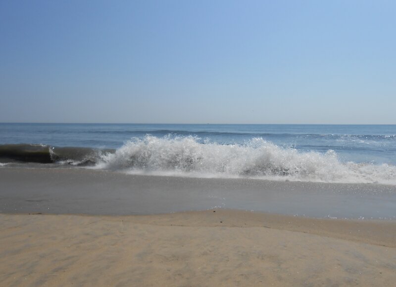 Wave Crashing on Beach — Blue, Calm, Afternoon