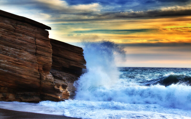 Wave Crashing on Cliff