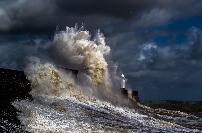 Wave Crashing on Lighthouse — Gray, Dramatic, Photograph, Sea