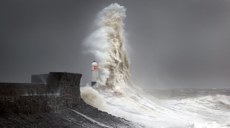 Wave Crashing on Lighthouse — Gray, Dramatic, Photograph, Sea Wall