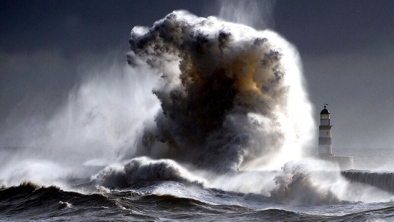 Wave Crashing on Lighthouse — Gray, Dramatic