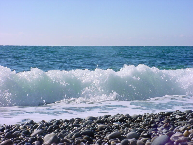 Wave Crashing on Pebble Beach — Blue