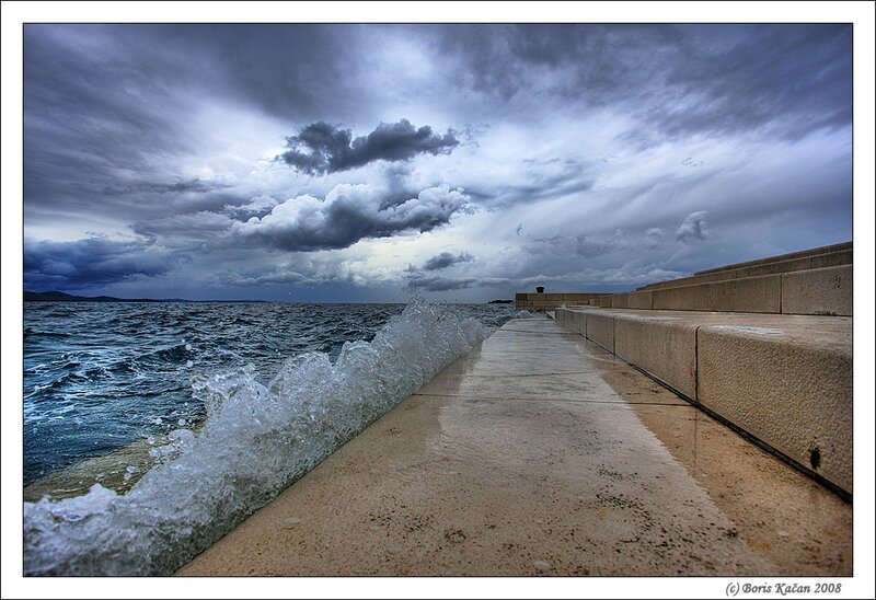 Wave Crashing on Pier — Blue, Dramatic, Photograph