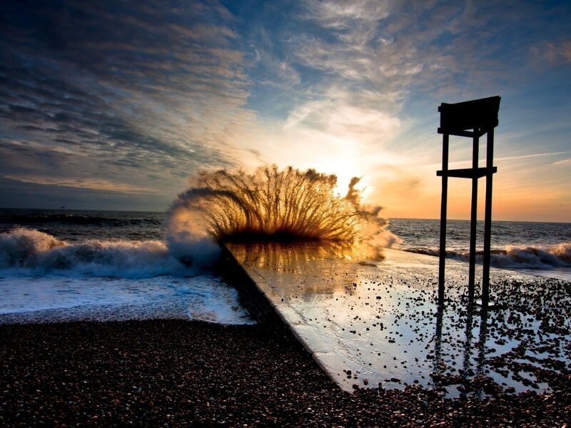 Wave Crashing on Pier — Blue, Dramatic, Sunset, Photograph, Lifeguard Stand