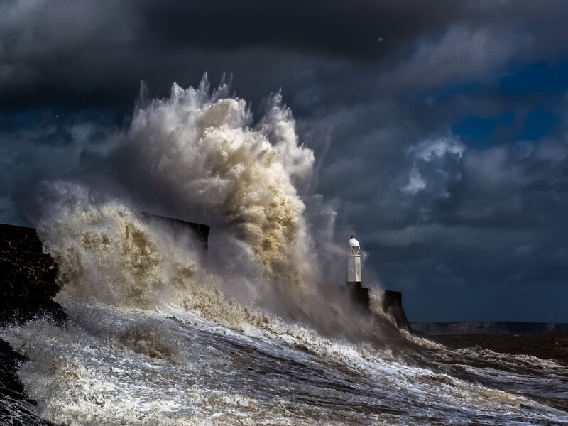 Wave Crashing on Pier — Gray